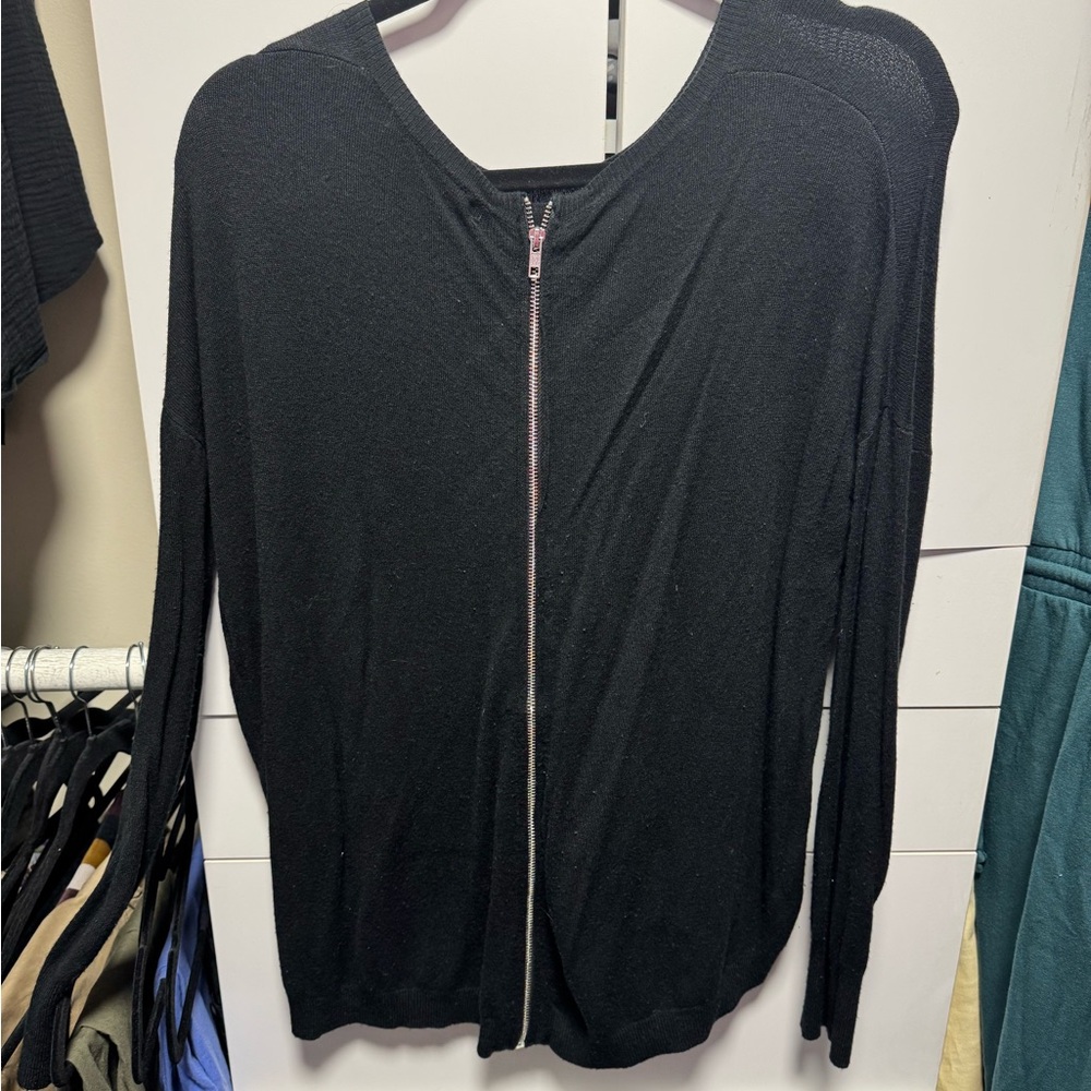 Black sweater with zipper in the back